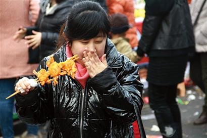 今天鬧元宵 糖球開會(huì)游人開胃